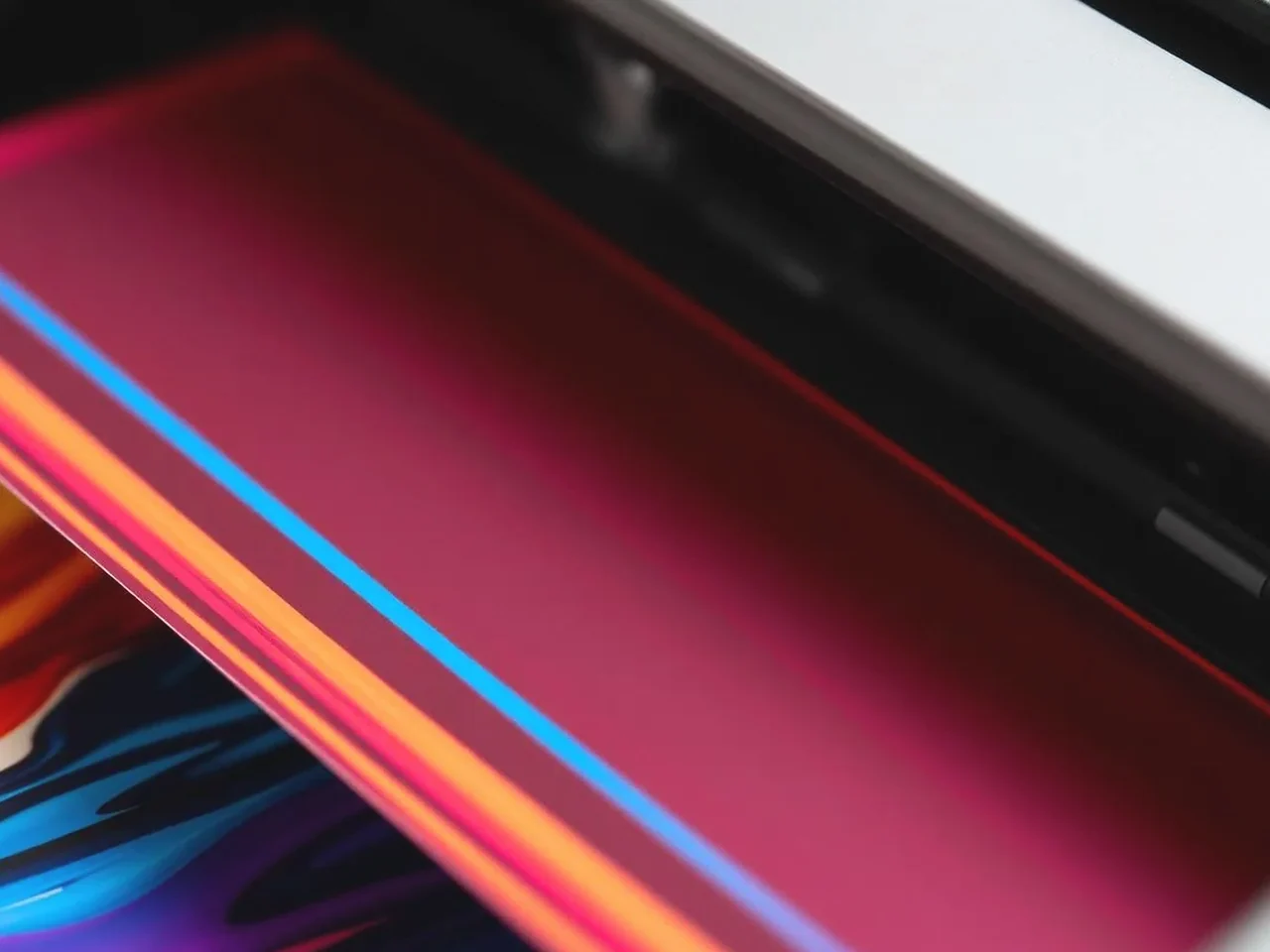 Close-up of vibrant CMYK digital print output on premium paper at Al-Anaab Dubai